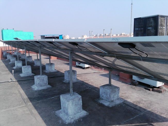 Rows of tilted modules spaced so that no row shades the one behind it.